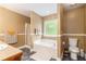 Serene bathroom with soaking tub, separate shower, and neutral decor at 3210 Avondale Pkwy, Powder Springs, GA 30127