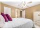 Cozy bedroom featuring a ceiling fan and comfortable decor and furniture at 3210 Avondale Pkwy, Powder Springs, GA 30127