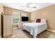 Comfortable bedroom with natural light and neutral color palette at 3210 Avondale Pkwy, Powder Springs, GA 30127
