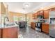 Open concept kitchen featuring stainless steel appliances, granite countertops, and eating area at 3210 Avondale Pkwy, Powder Springs, GA 30127