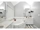 Bright primary bathroom with a large soaking tub, double vanity, and stylish tile accents at 3320 Goldmist Dr, Buford, GA 30519