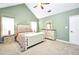 Warm bedroom with a bed, complemented by stylish nightstands and windows offering natural light at 3320 Goldmist Dr, Buford, GA 30519