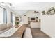 Open concept view of the living room, dining room with high ceilings and lots of natural light at 3320 Goldmist Dr, Buford, GA 30519