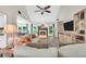Cozy living room with a fireplace, hardwood floors, and open concept layout at 3320 Goldmist Dr, Buford, GA 30519
