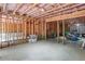 Unfinished basement with exposed beams at 3920 Baverton Dr, Suwanee, GA 30024