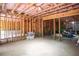 Unfinished basement with exposed beams at 3920 Baverton Dr, Suwanee, GA 30024