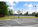 Community basketball court featuring a full-size court, basketball hoop, and ample space for recreational activities at 3920 Baverton Dr, Suwanee, GA 30024
