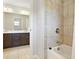 Bathroom with a shower-tub combo and a neutral color scheme at 3920 Baverton Dr, Suwanee, GA 30024