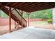 Covered patio with stairs and a backyard at 3920 Baverton Dr, Suwanee, GA 30024