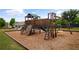 Community playground with a variety of play structures, including slides, swings, and climbing areas at 3920 Baverton Dr, Suwanee, GA 30024