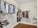 Bright walk-in closet with wire shelving for optimal storage and organization at 3920 Baverton Dr, Suwanee, GA 30024