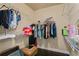 Spacious walk-in closet with custom shelving and ample storage space for clothing at 3920 Baverton Dr, Suwanee, GA 30024