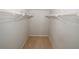 Walk-in closet equipped with shelving, providing ample storage space and organization at 5461 Park S Pl, Atlanta, GA 30349