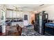 Kitchen featuring black appliances, dark marble floors, and an adjacent dining table at 2087 Chestnut Way, Lithia Springs, GA 30122