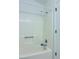 Bathroom with bathtub/shower and a white surround at 225 Magnolia Tree Ct, Johns Creek, GA 30022