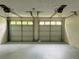Clean and bright two car garage at 225 Magnolia Tree Ct, Johns Creek, GA 30022