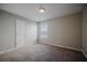 Bedroom featuring neutral walls, a window, and a door at 3223 Tallon Sw Ln, Atlanta, GA 30311
