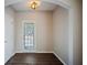 Welcoming entryway featuring wood-look floors, natural light and adjacent closet at 3223 Tallon Sw Ln, Atlanta, GA 30311