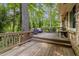 Spacious wooden deck perfect for outdoor living with lush surrounding greenery at 3362 Northbrook Dr, Atlanta, GA 30340