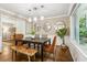 Dining room features a bench and large windows at 3362 Northbrook Dr, Atlanta, GA 30340
