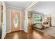Inviting foyer with hardwood floors and natural light, leading to the living area at 3362 Northbrook Dr, Atlanta, GA 30340