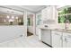 Bright kitchen featuring white cabinets, granite countertops, and stainless steel appliances at 3362 Northbrook Dr, Atlanta, GA 30340