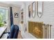 Inviting living room features a white brick wall, a decorative fireplace, and large window at 3362 Northbrook Dr, Atlanta, GA 30340