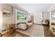 Bright living room featuring hardwood floors, large window, and stylish decor at 3362 Northbrook Dr, Atlanta, GA 30340