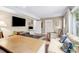 Living room featuring a large screen TV and a comfortable seating area at 3362 Northbrook Dr, Atlanta, GA 30340