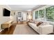 Bright living room with large windows, hardwood floors, and modern decor at 3362 Northbrook Dr, Atlanta, GA 30340