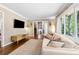 Bright living room with large windows, hardwood floors, and modern decor at 3362 Northbrook Dr, Atlanta, GA 30340