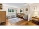 Stylish bedroom featuring a Bedroom area, wood floors and stylish furnishings at 3362 Northbrook Dr, Atlanta, GA 30340
