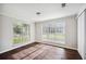 Bedroom featuring natural light and hardwood floors creating a bright and welcoming atmosphere at 5555 Mountain Springs Cir, Stone Mountain, GA 30088