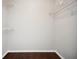 Walk-in closet with white wire shelving provides ample storage for clothing and accessories at 5555 Mountain Springs Cir, Stone Mountain, GA 30088