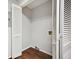 Laundry room with bi-fold door and wire shelving at 5555 Mountain Springs Cir, Stone Mountain, GA 30088