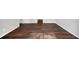 Open-concept living room featuring hardwood floors and natural light at 5555 Mountain Springs Cir, Stone Mountain, GA 30088