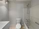 Bathroom featuring a single vanity, a toilet, and a shower and bathtub combo at 219 Cobblestone Trl, Avondale Estates, GA 30002