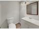 Bathroom featuring a double vanity and a toilet at 219 Cobblestone Trl, Avondale Estates, GA 30002