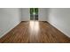 Bedroom with hardwood flooring and a sliding glass door at 219 Cobblestone Trl, Avondale Estates, GA 30002
