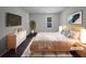Comfortable bedroom with a large window and modern furniture at 219 Cobblestone Trl, Avondale Estates, GA 30002