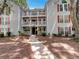 Inviting condo building with well-maintained landscaping and classic architecture at 219 Cobblestone Trl, Avondale Estates, GA 30002