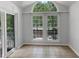 Sunroom with large windows and sliding door allowing for lots of natural light at 219 Cobblestone Trl, Avondale Estates, GA 30002