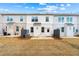 The backyard features a white painted brick exterior and patio space at 3610 Silvery Way, Powder Springs, GA 30127
