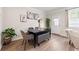 Dining area with a dark wood table, upholstered chairs, and a bench seat at 3610 Silvery Way, Powder Springs, GA 30127