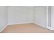 A bright and simple bedroom with neutral tones and a light wood floor at 4168 Arapaho Dr, Powder Springs, GA 30127