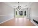 An airy dining room has natural light, and refined crown molding at 4168 Arapaho Dr, Powder Springs, GA 30127
