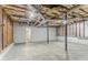 Spacious unfinished basement with exposed ceiling and concrete floor at 42 Breckenridge Dr, Powder Springs, GA 30127