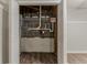 Basement closet shows water heater, pipes, and wooden studs exposed at 42 Breckenridge Dr, Powder Springs, GA 30127