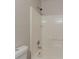 Bathroom with white shower and white tile at 42 Breckenridge Dr, Powder Springs, GA 30127