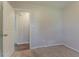 Bedroom with neutral colors and hardwood floors visible in the doorway at 42 Breckenridge Dr, Powder Springs, GA 30127